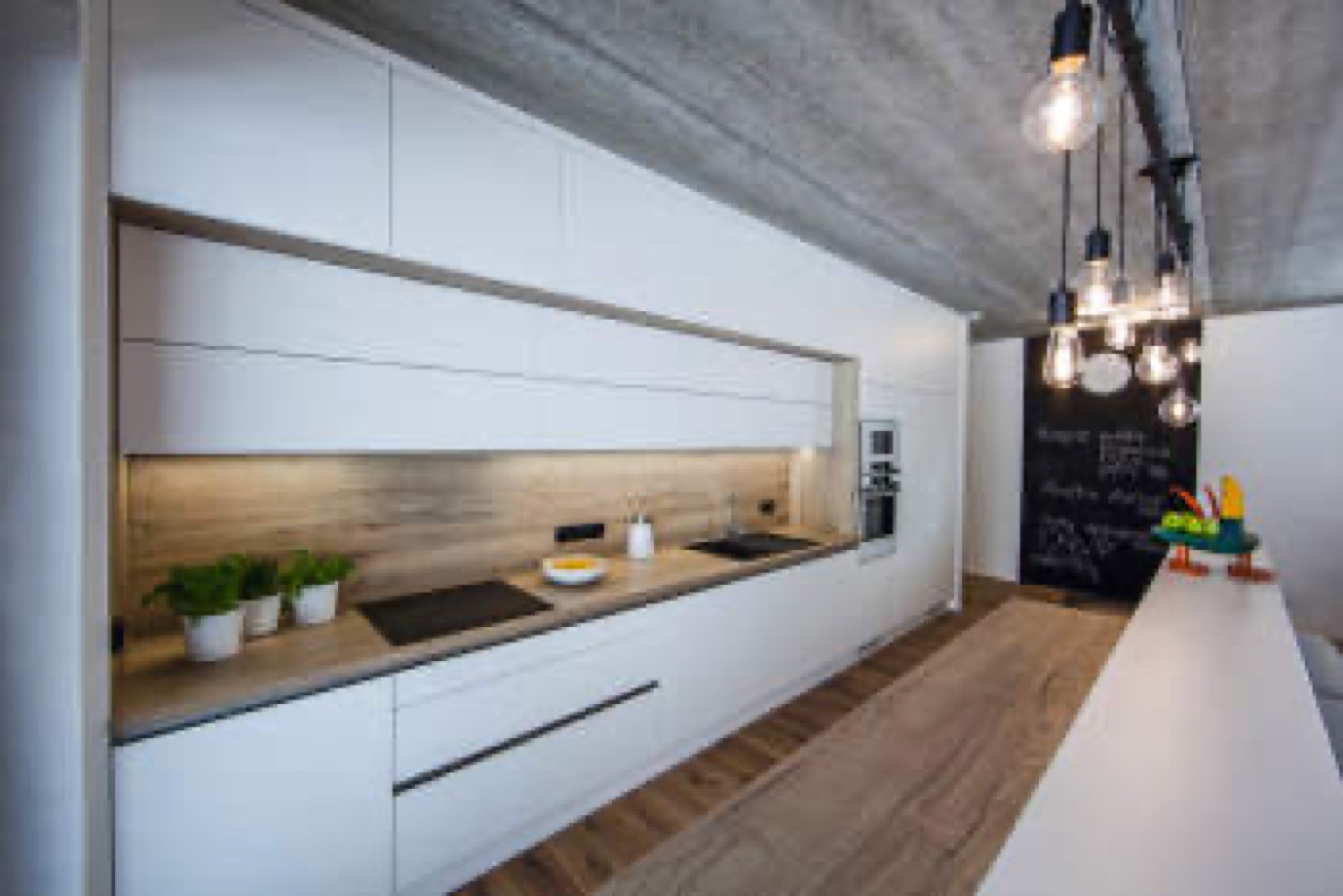 Modern handleless kitchen — real Luxova install in matte white