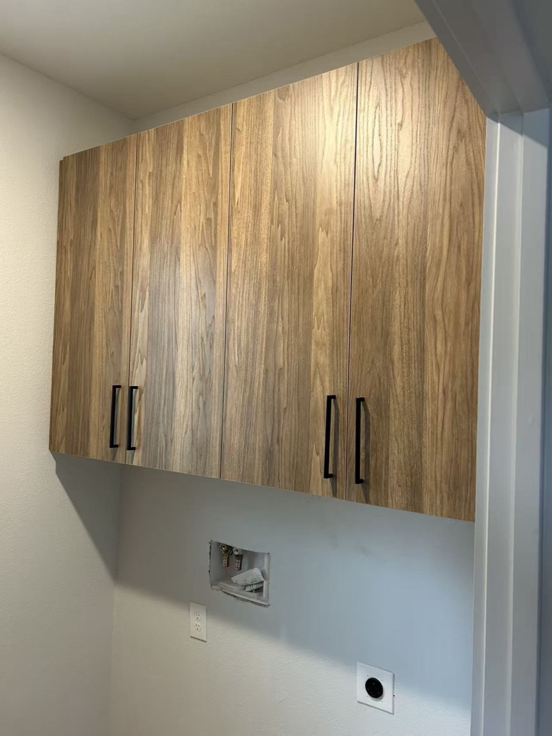 Laundry cabinets · woodgrain