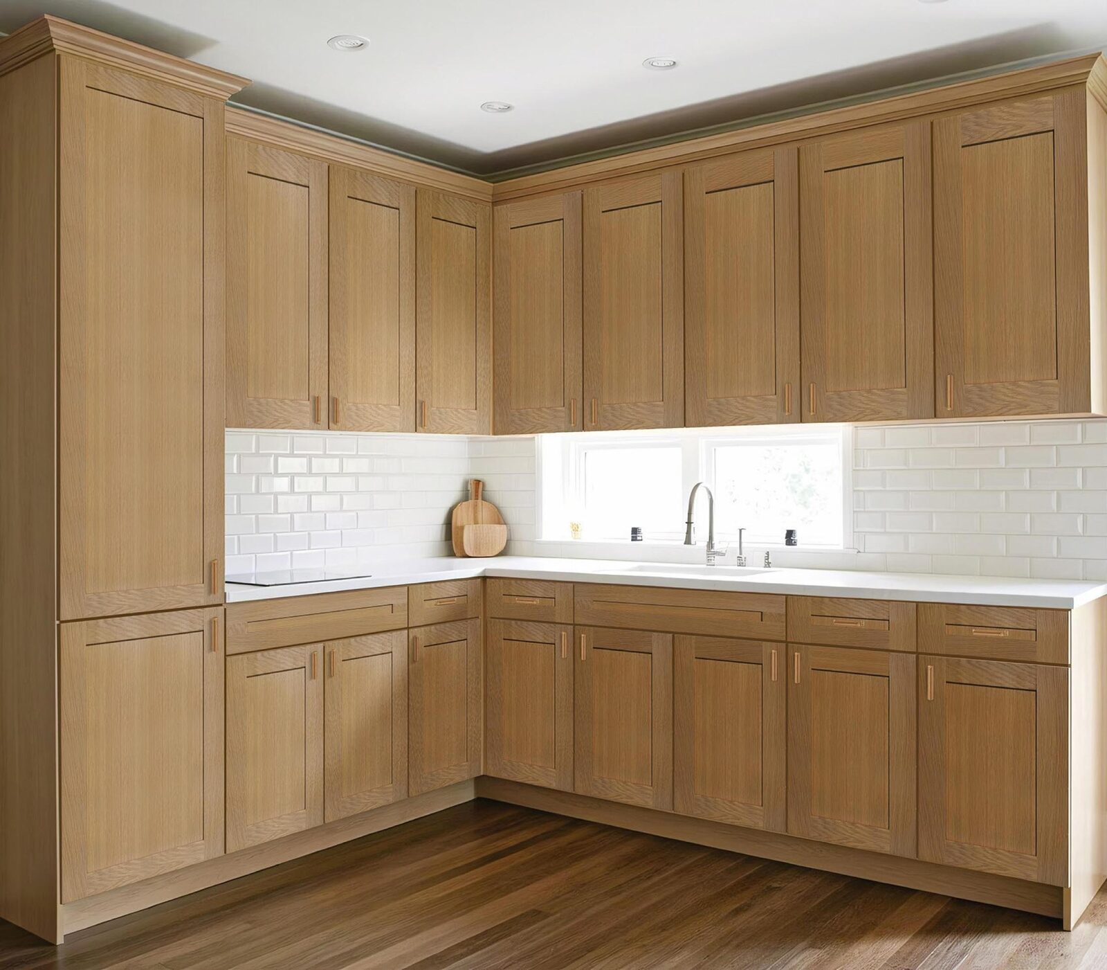 Shaker kitchen in natural oak with a subway-tile backsplash